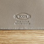 Pochette en cuir pour passeport Tods et Monocle